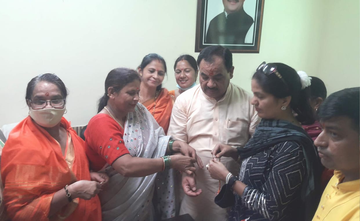 Sisters tie rakhi of affection on the wrists of brothers