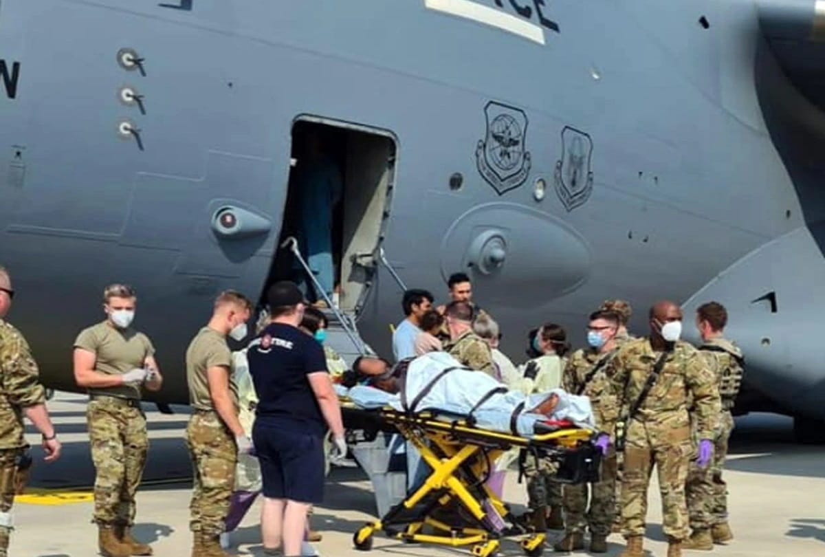 Afghanistan woman labor pains in flying plane us air force help in delivery at Ramstein Air Base Germany