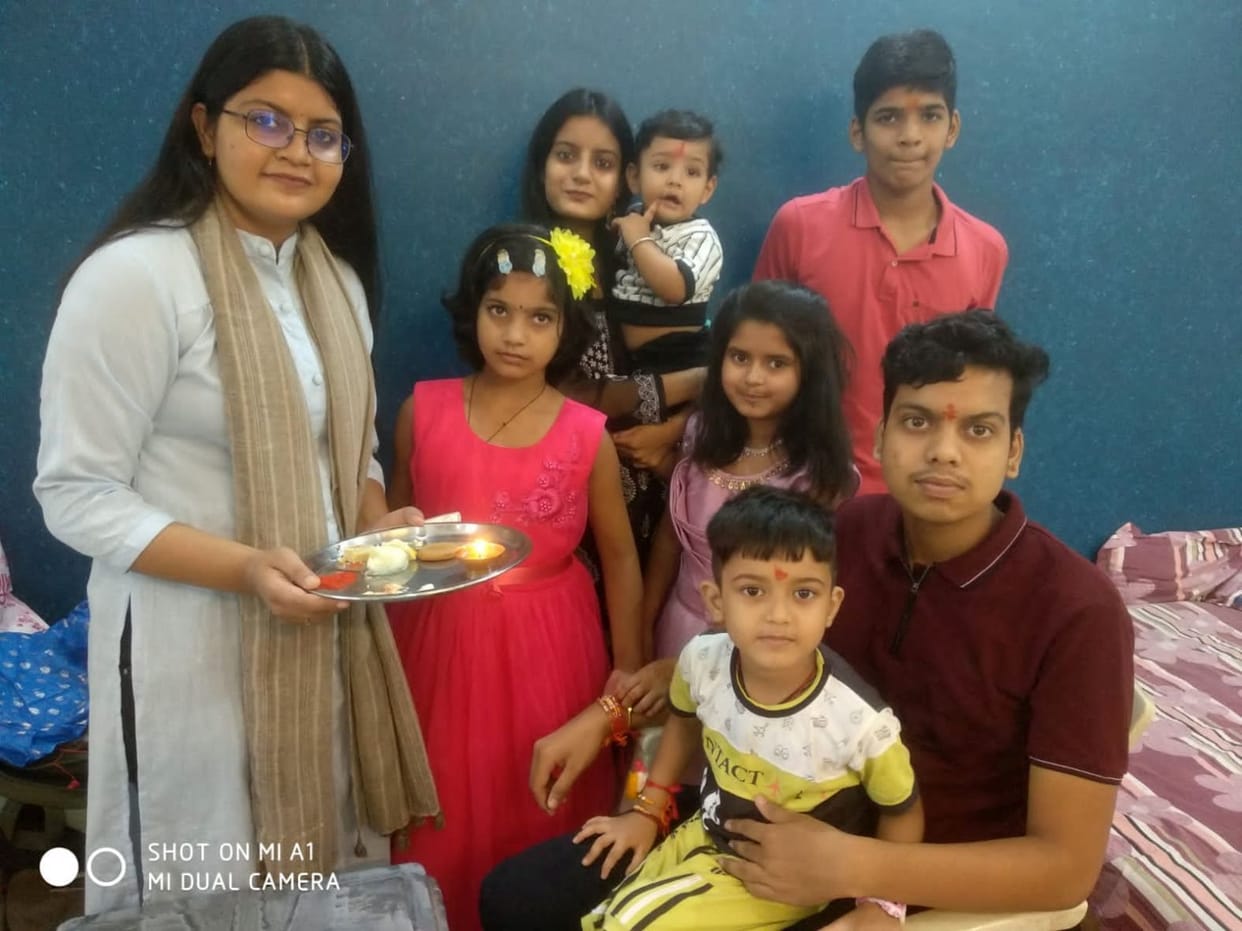 Sisters tie the strings of affection on the wrists of brothers