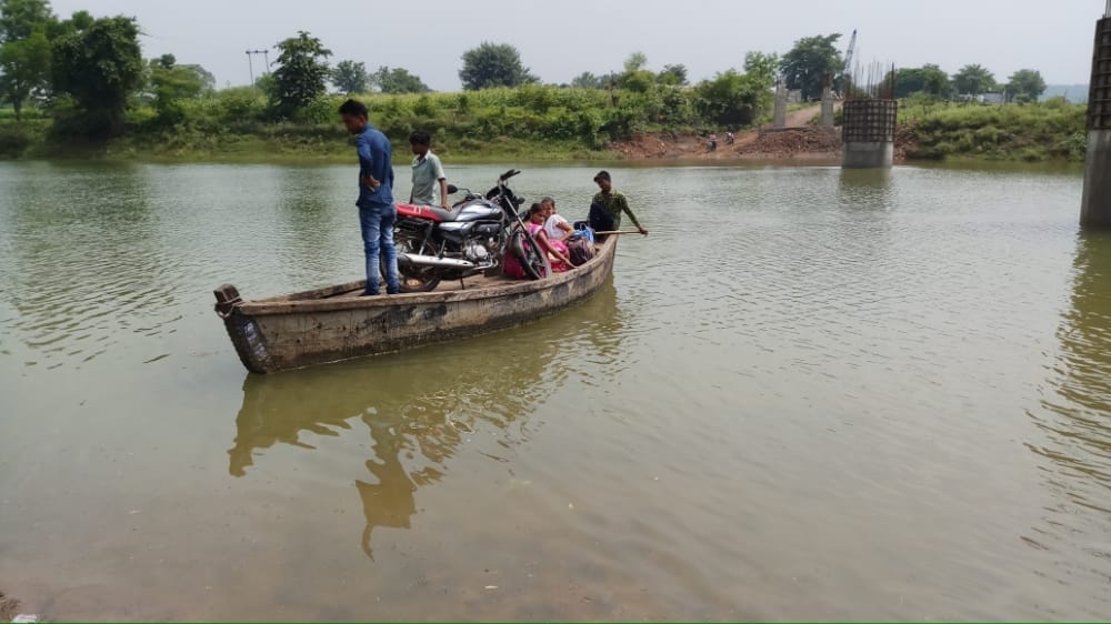 bridge covered with water, villager cross river by boat