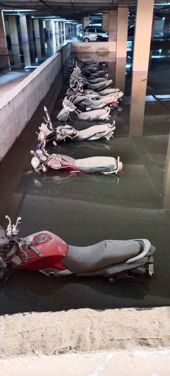 Rain water accumulated in the basement, bike and scooty getting spoiled