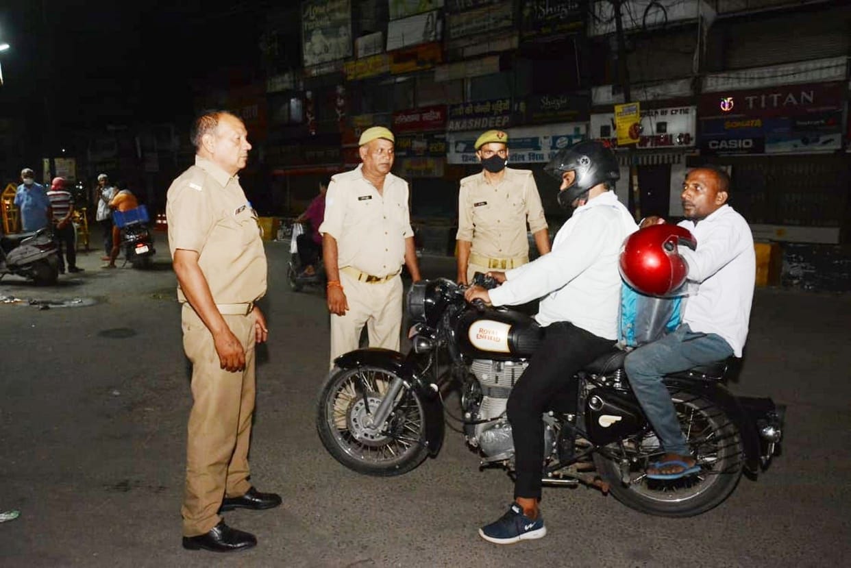 Car climbed on policeman, escaped while firing