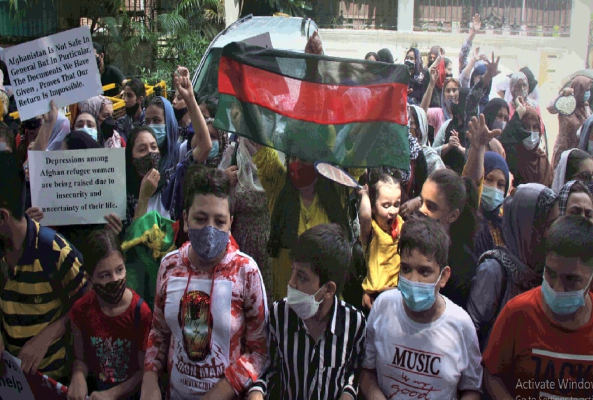 people of afghan origin protest in front of the un high commissioner in delhi