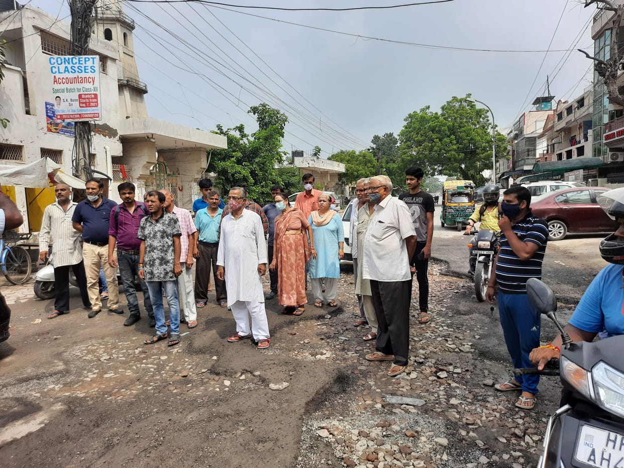 The road built two months ago in Sector-14 was broken in the rain