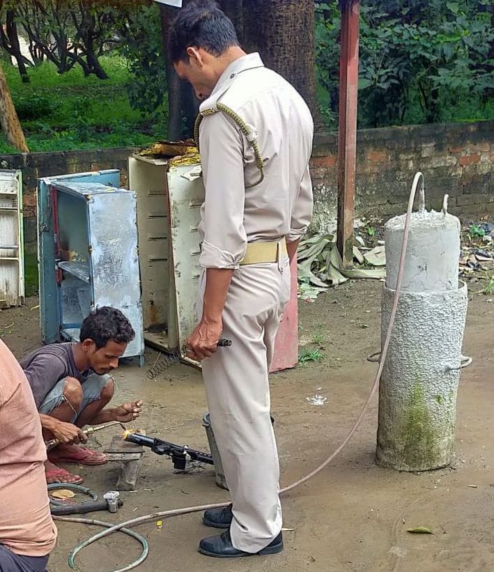 Government carbine being repaired on the pavement