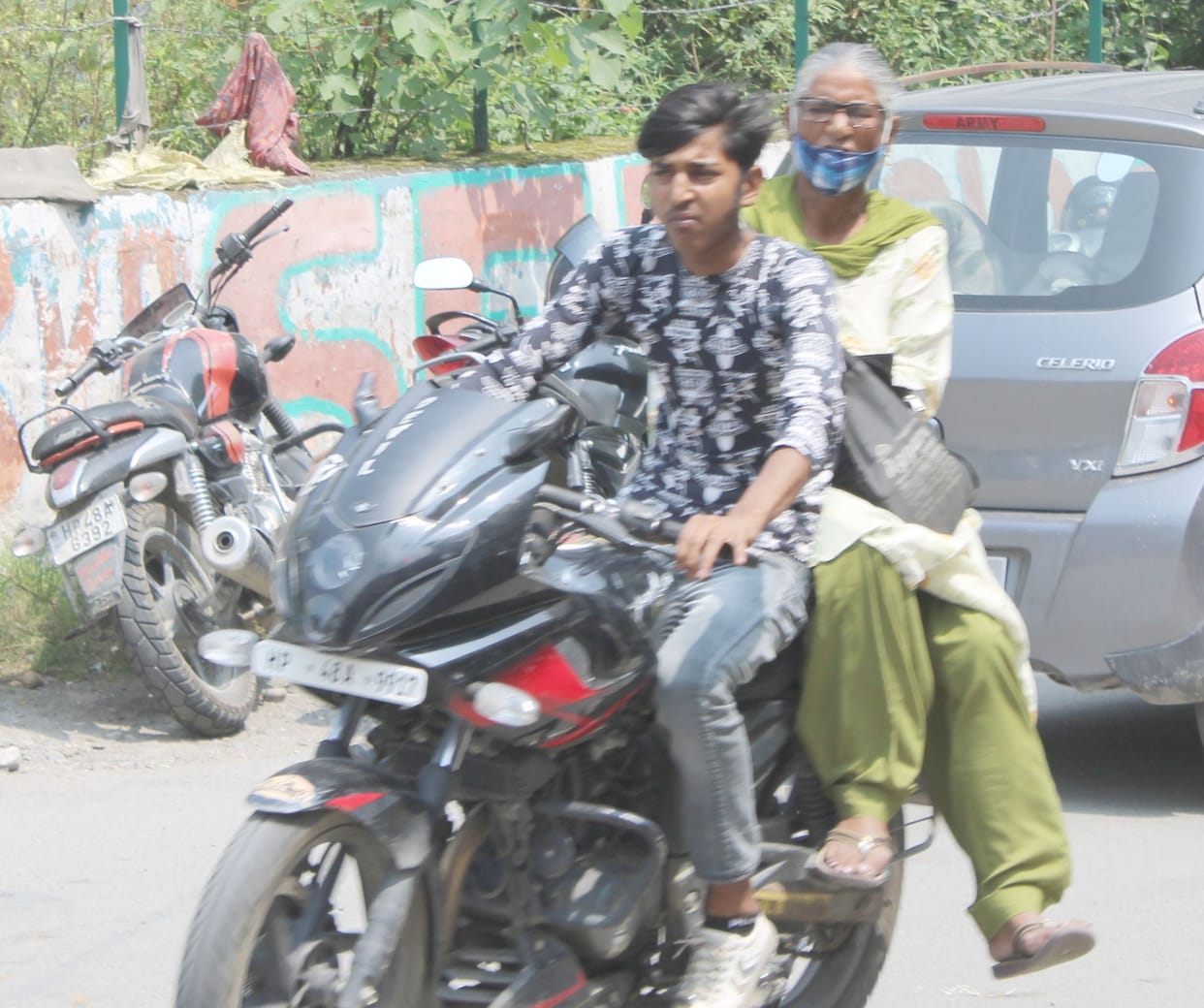 Bikes running outside the city without helmet