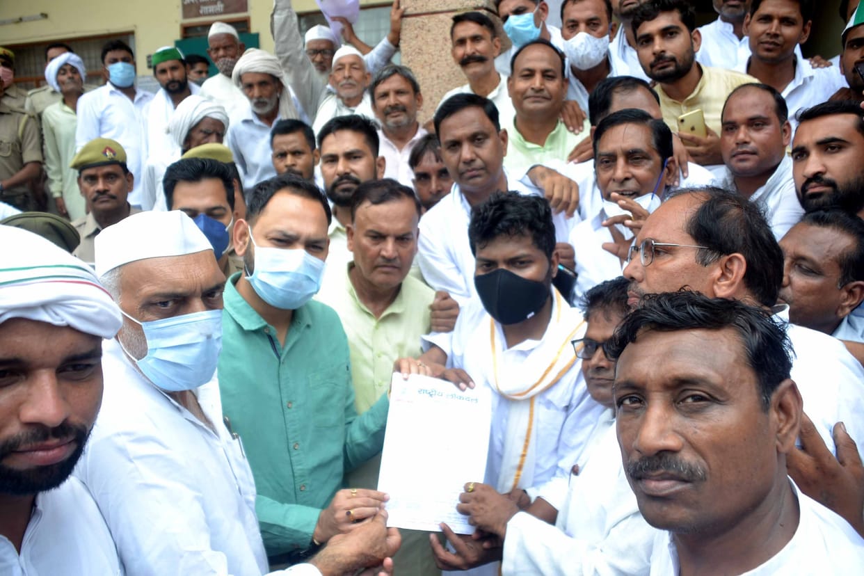 Kisan Union workers picket in the Collectorate