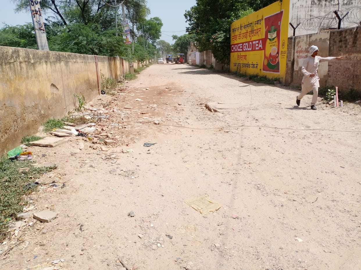 allergy in peoples eyes due to flying dust on broken roads