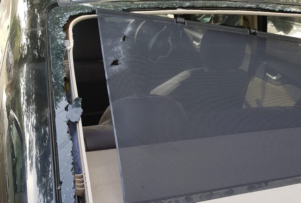 A youth suffered gunshot injury on the head after driver of a car opened fire on a group of friends