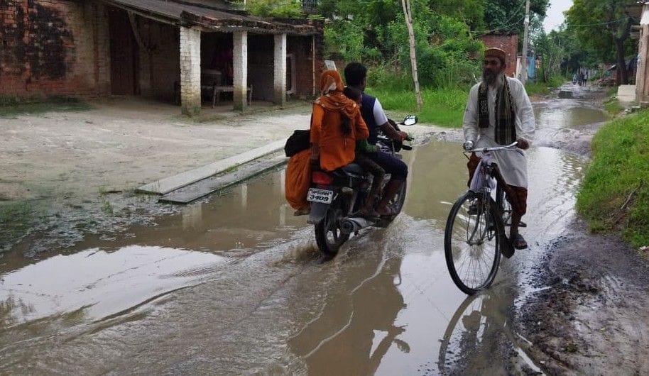 Waterlogging made it difficult to walk on the main road of the village