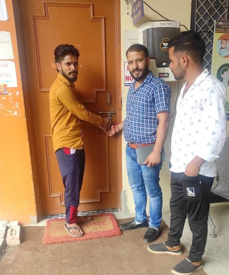 Angry members put a lock on the office