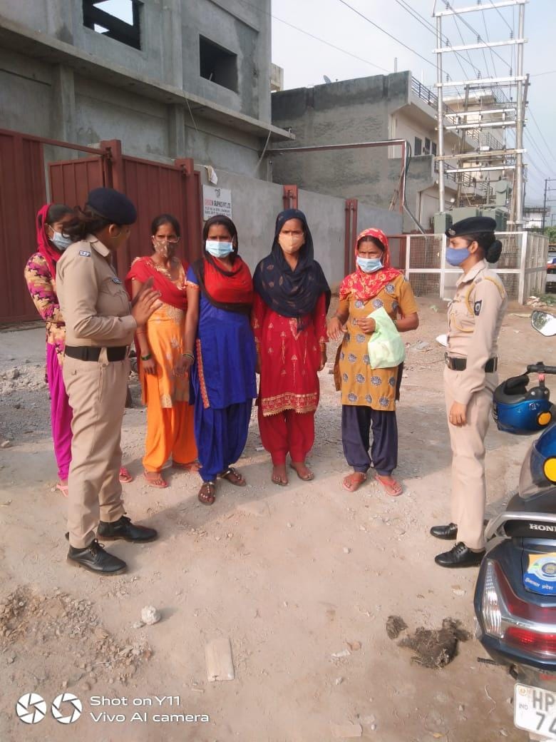 Lady police in Baddi on scooty roaming slums and crowded areas to teach ladies about their rights and duties