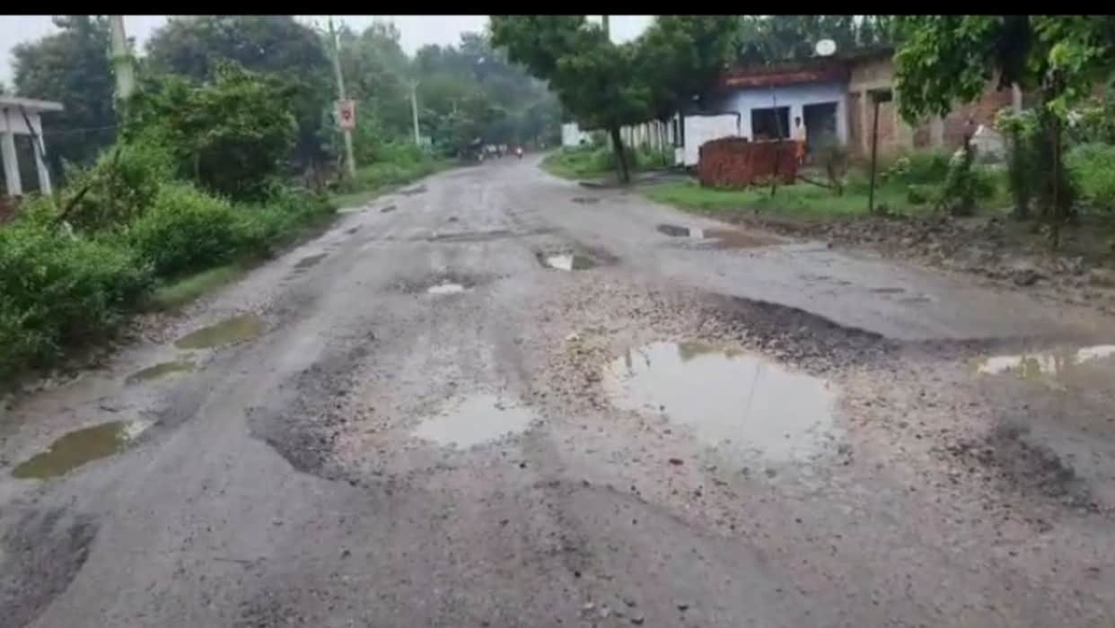 Due to the pressure of heavy vehicles, potholes are everywhere on the road.