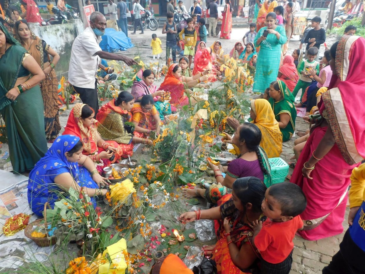 Women perform Chhath Puja, wishing for son's long life