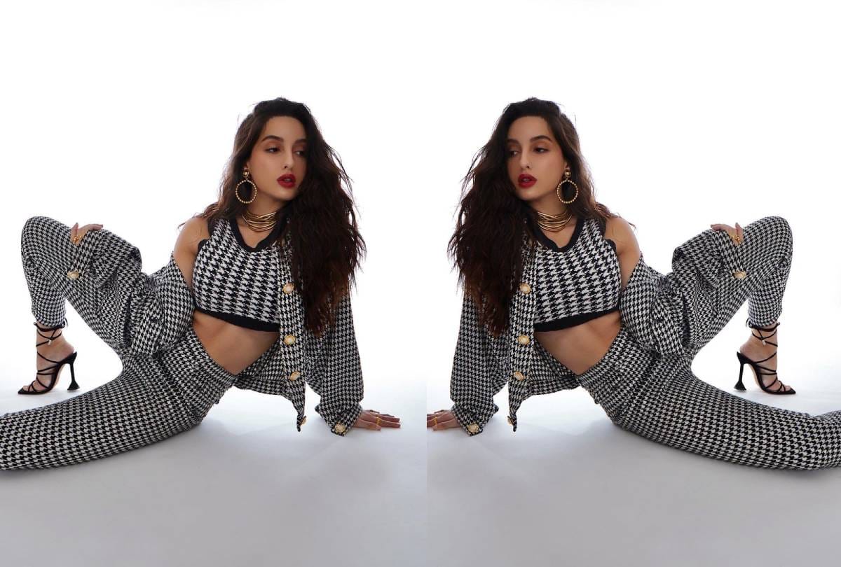 Nora fatehi black and white printed crop top and jacket look photo goes viral
