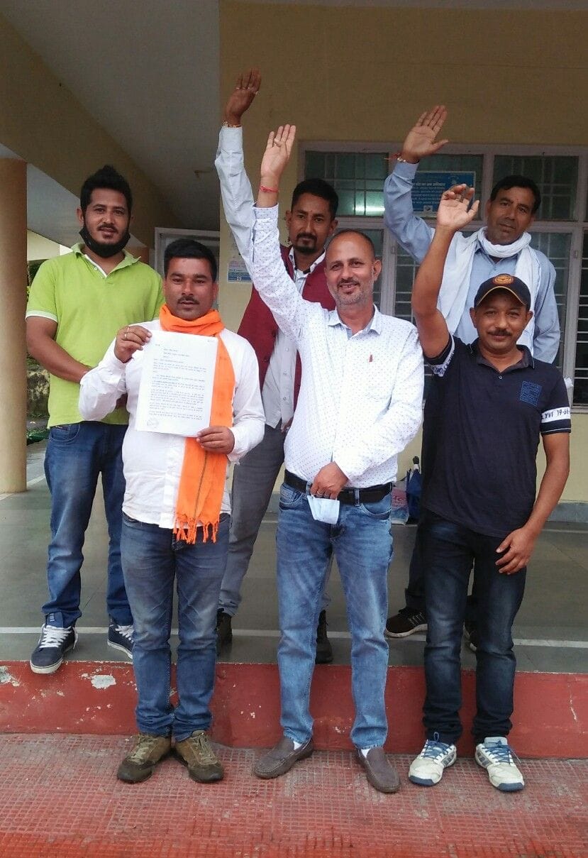 Demonstration of villagers of Kausani in DM office in protest against Nagar Panchayat