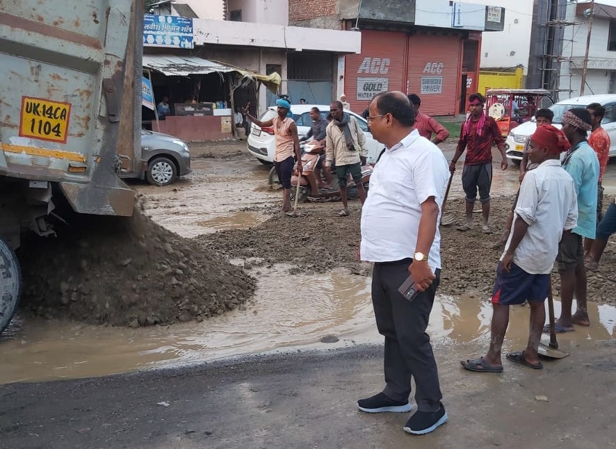 Water filled in pits near City Hospital, traffic affected