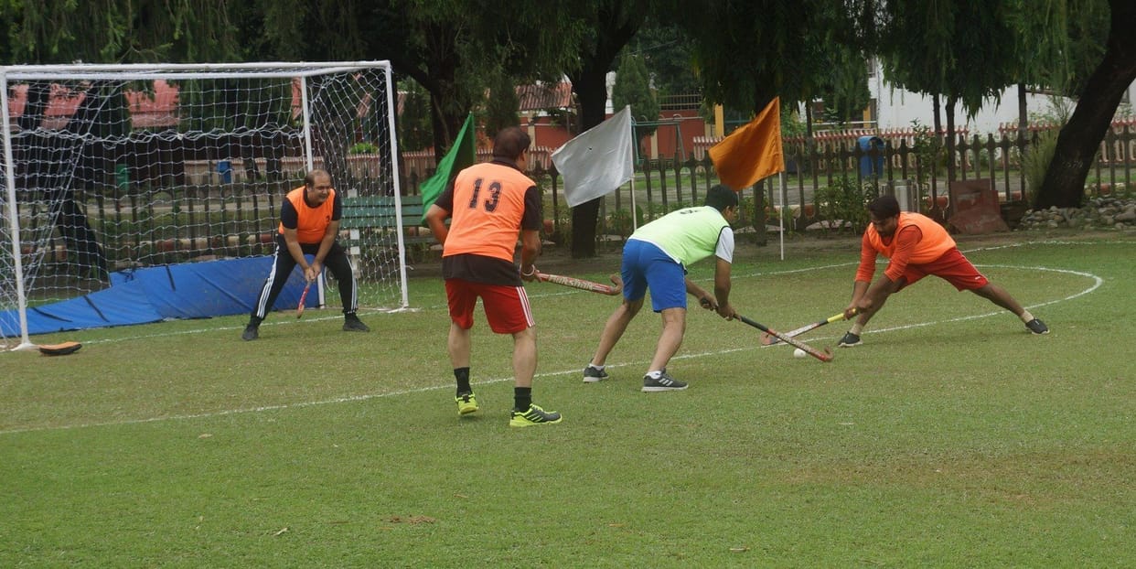 Teachers and children played hockey match in DPS