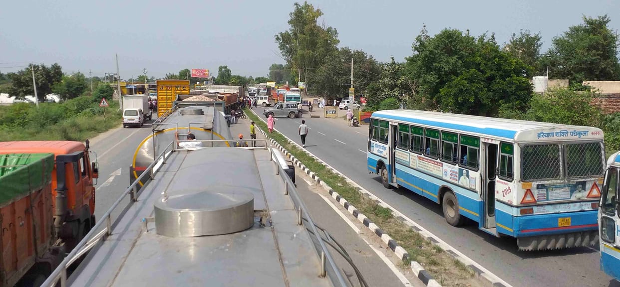 Roadways buses stuck due to farmers' highway jamming, passengers remain upset