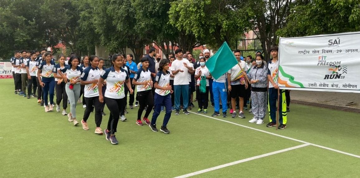 Olympic medal winners honored on Sports Day