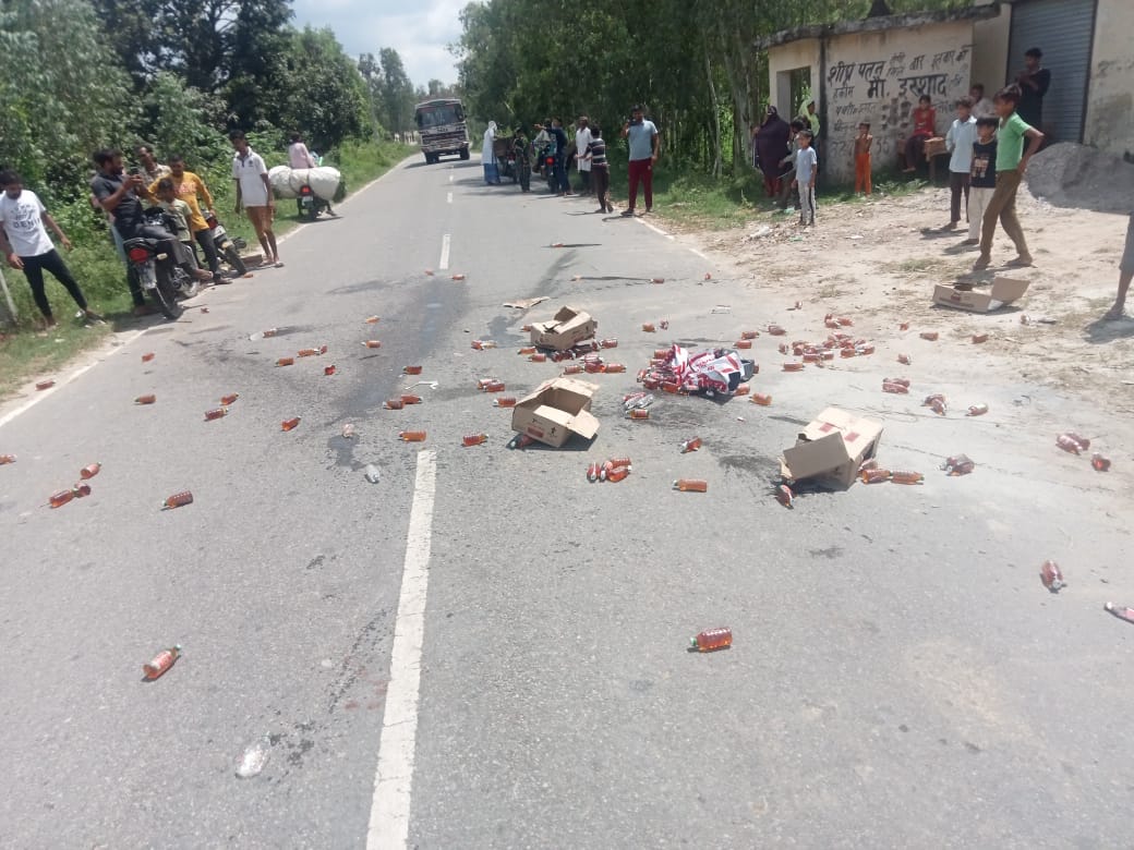 Liquor contract vandalized, bottles thrown on the road