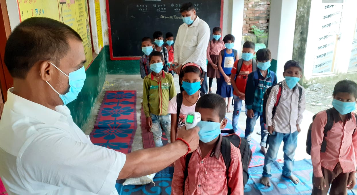 Children who reached school were welcomed with roli and flowers