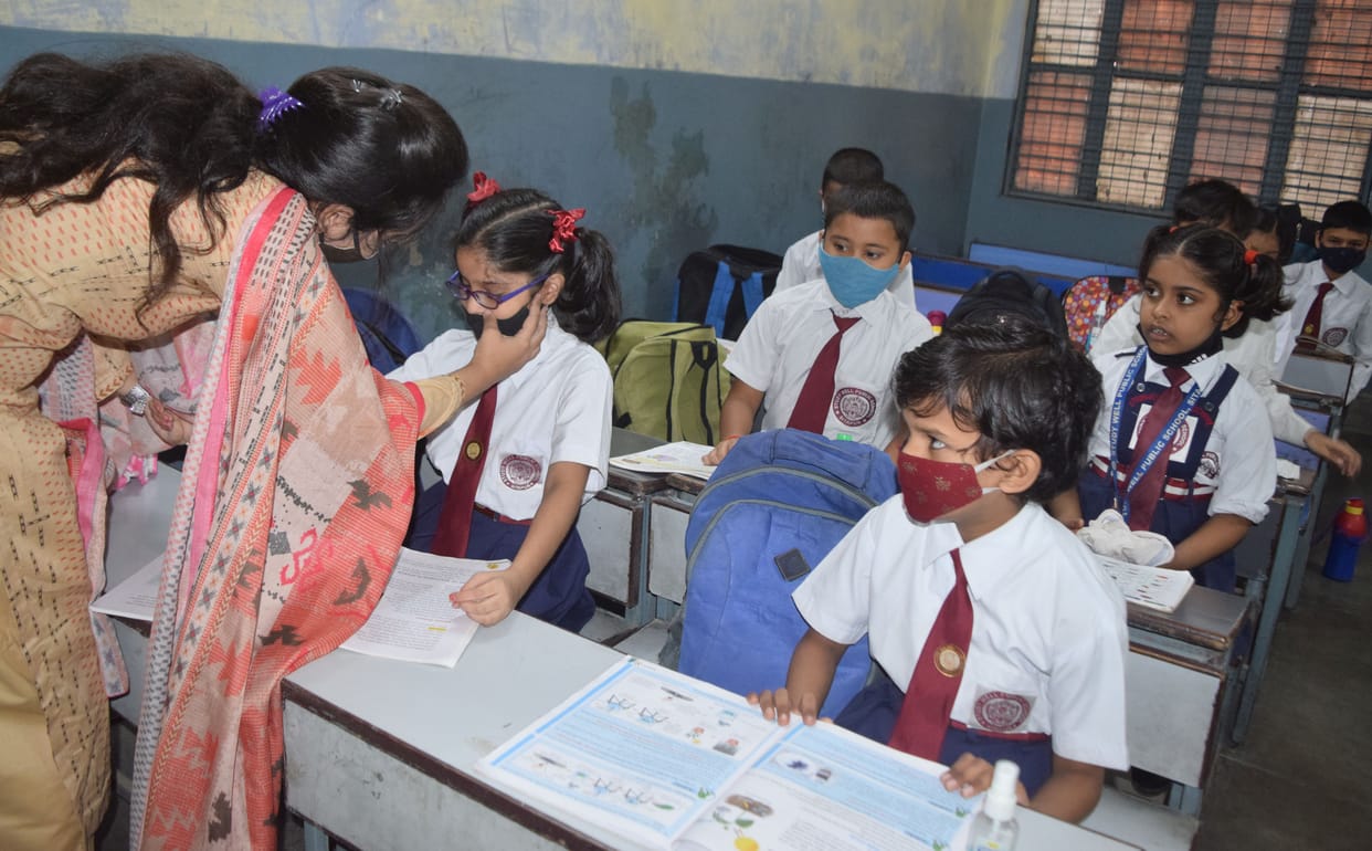 Children arrived in primary schools laughing and crying
