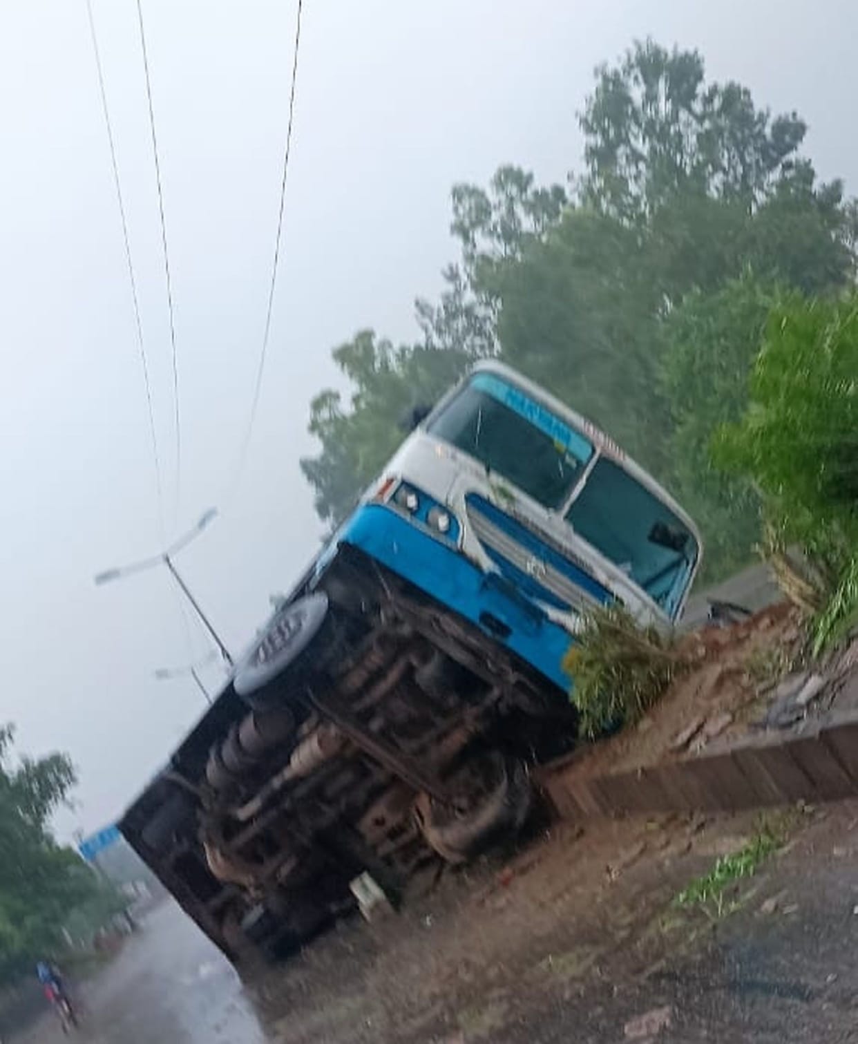 8 passengers including the driver were injured when the bus overturned