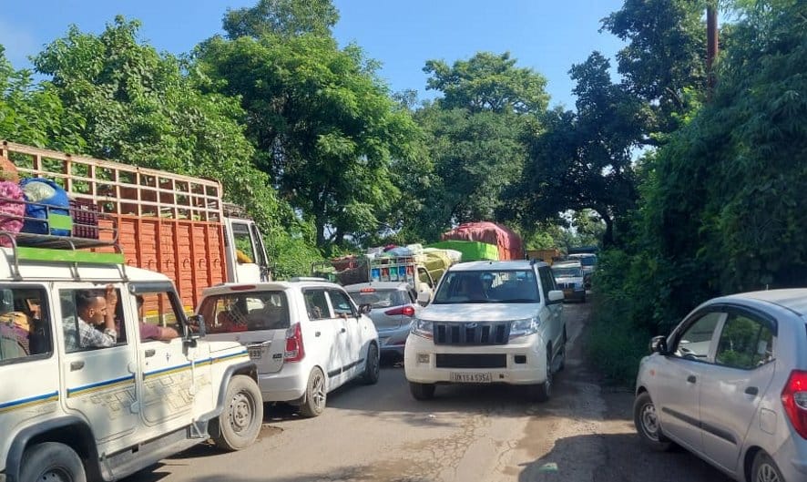 jam on the potholed highway