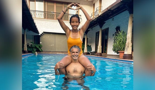photo:Milind Soman Lifts Wife Ankita Konwar On His Shoulder