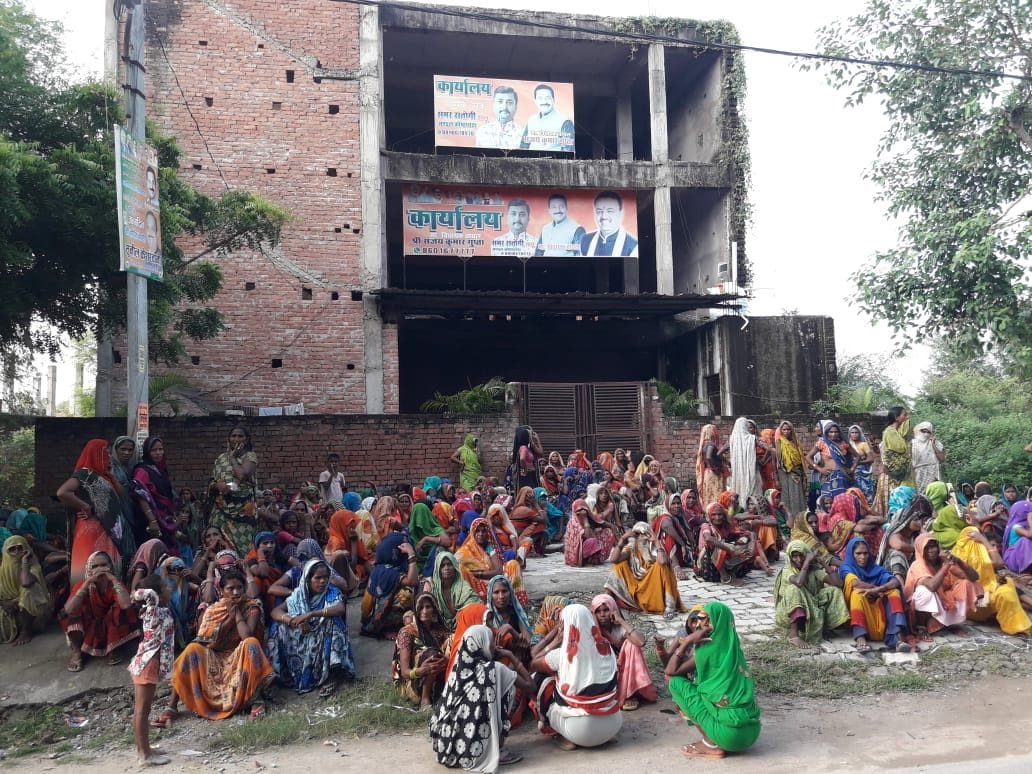 Women were sitting in front of the MLA's office all day long waiting for the sari