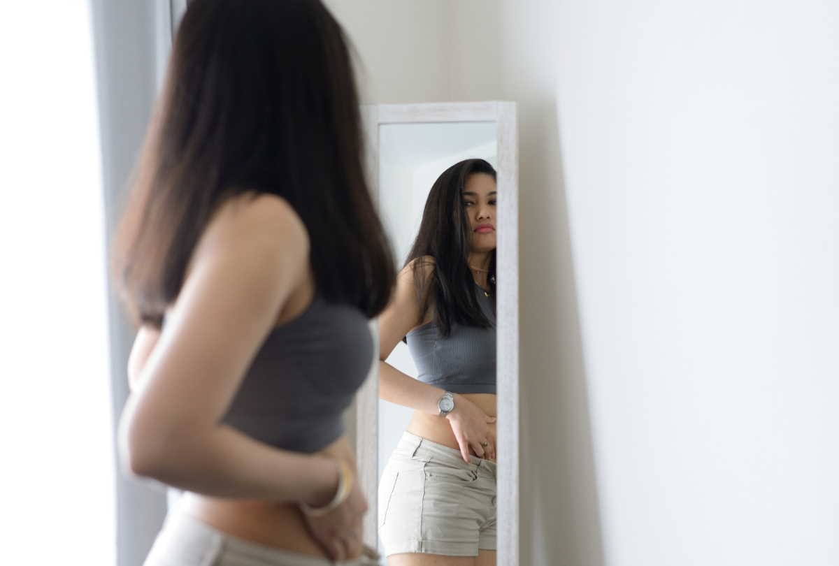 what are the causes and symptoms of body dysmorphic disorder