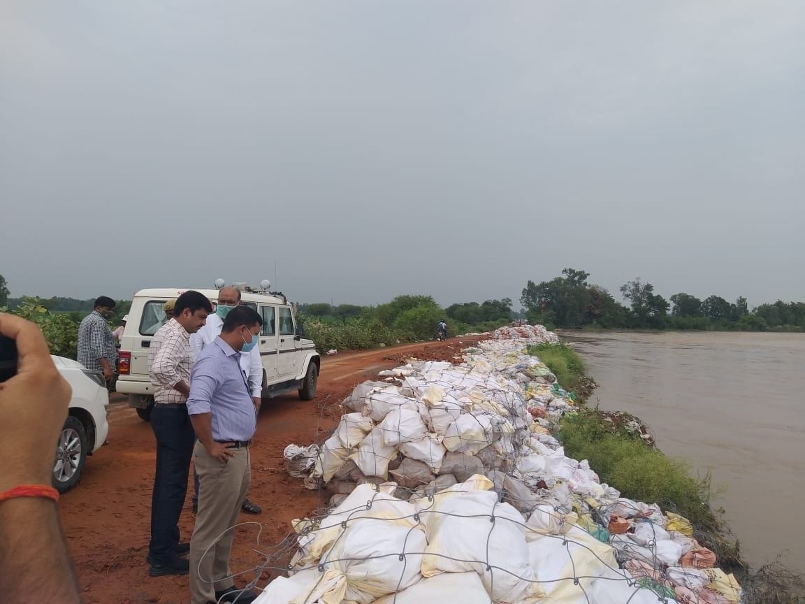 DM took stock of road repair work being done at Madhwapur Ghat