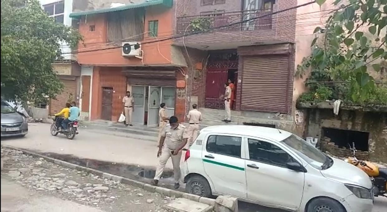 The attackers shot and killed the financier with a knife