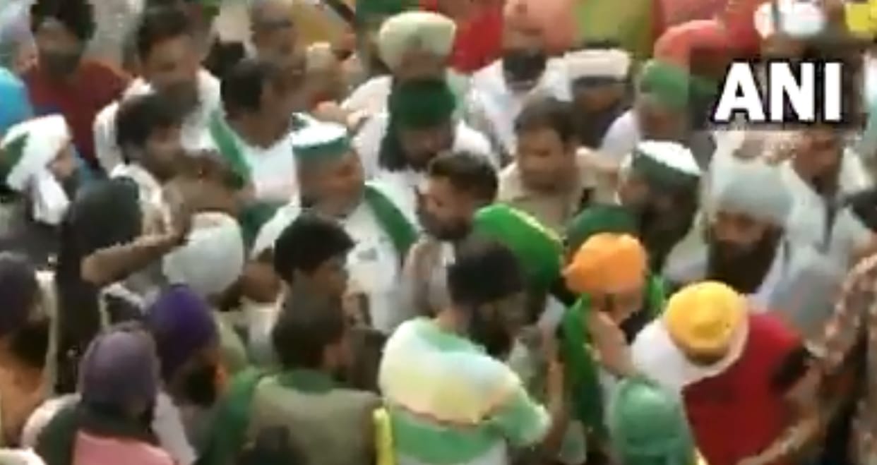 Farmers gather to burn effigy with photo of PM Modi CM Yogi and Amit Shah