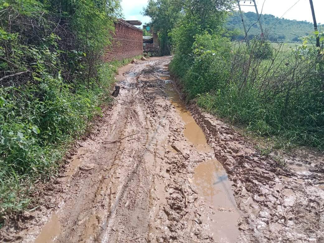 mud filled road, students frustrated