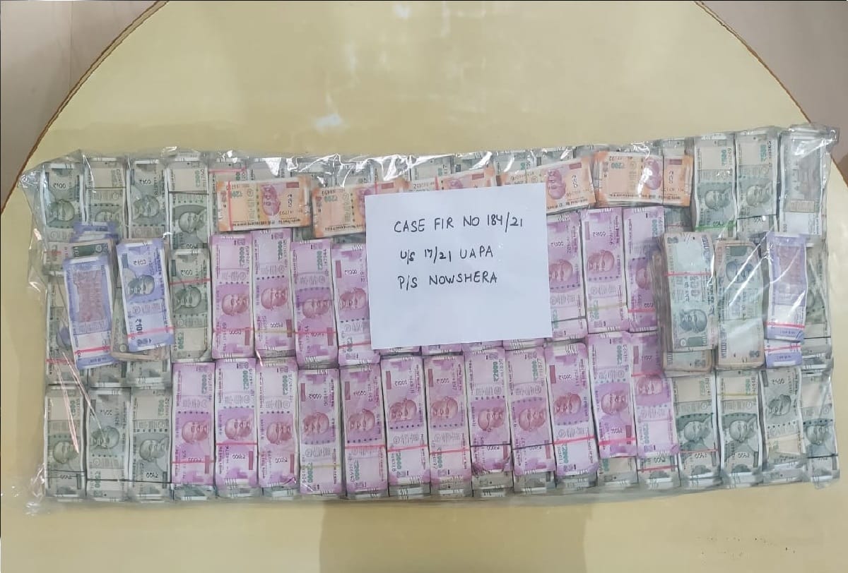 Police and Indian Army found two bags full of notes amounting more than one and half crore during search operation
