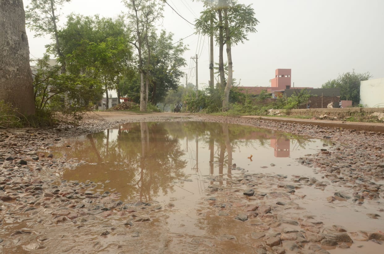 Man Just be careful... ten roads made of 12 crores got washed away in the rain
