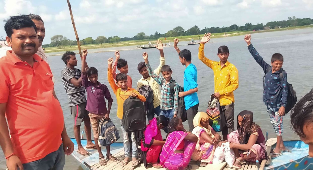 Angry students protested on boat due to non-construction of Belhia bridge