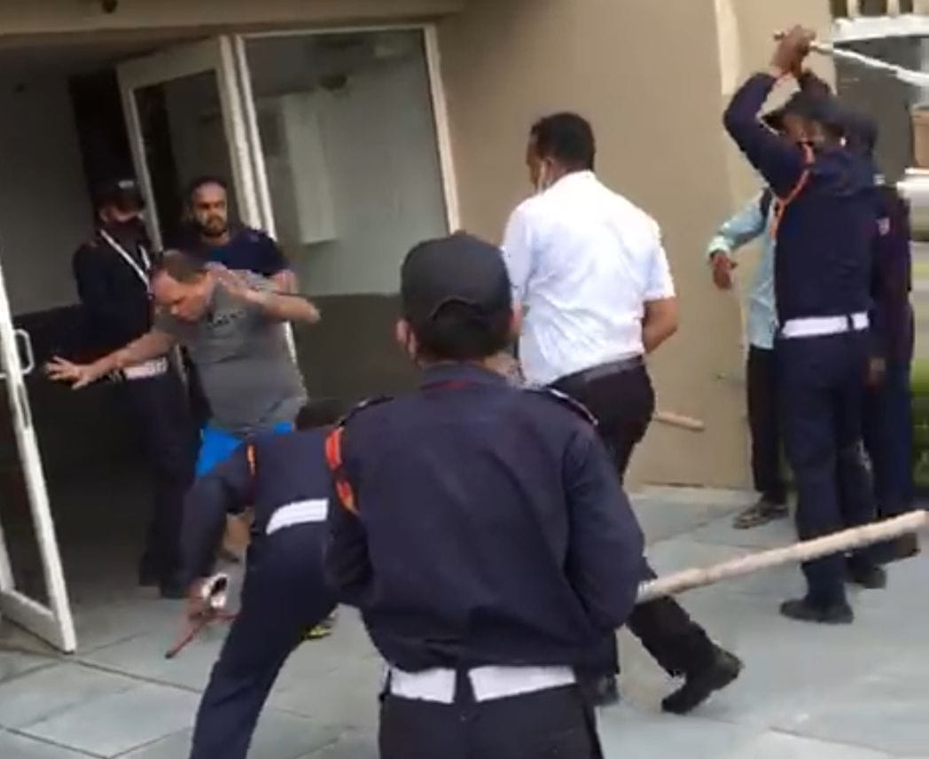 The guards made the society resident unconscious by beating them with sticks