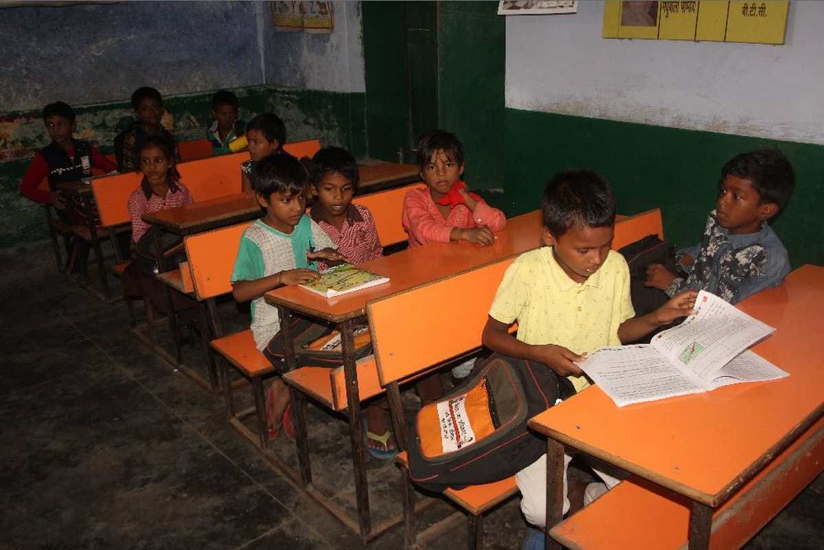 Varanasi primary schools condition is poor children do not have shoes bags are made of sacks