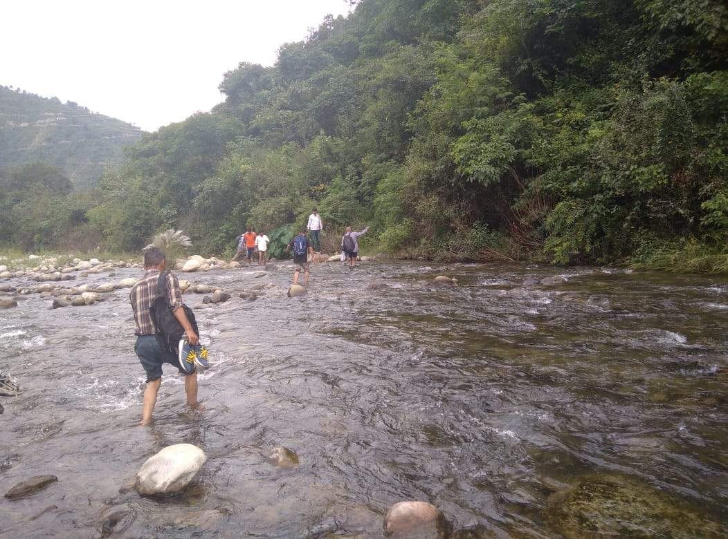 Crossing the river Machlad to go the destination