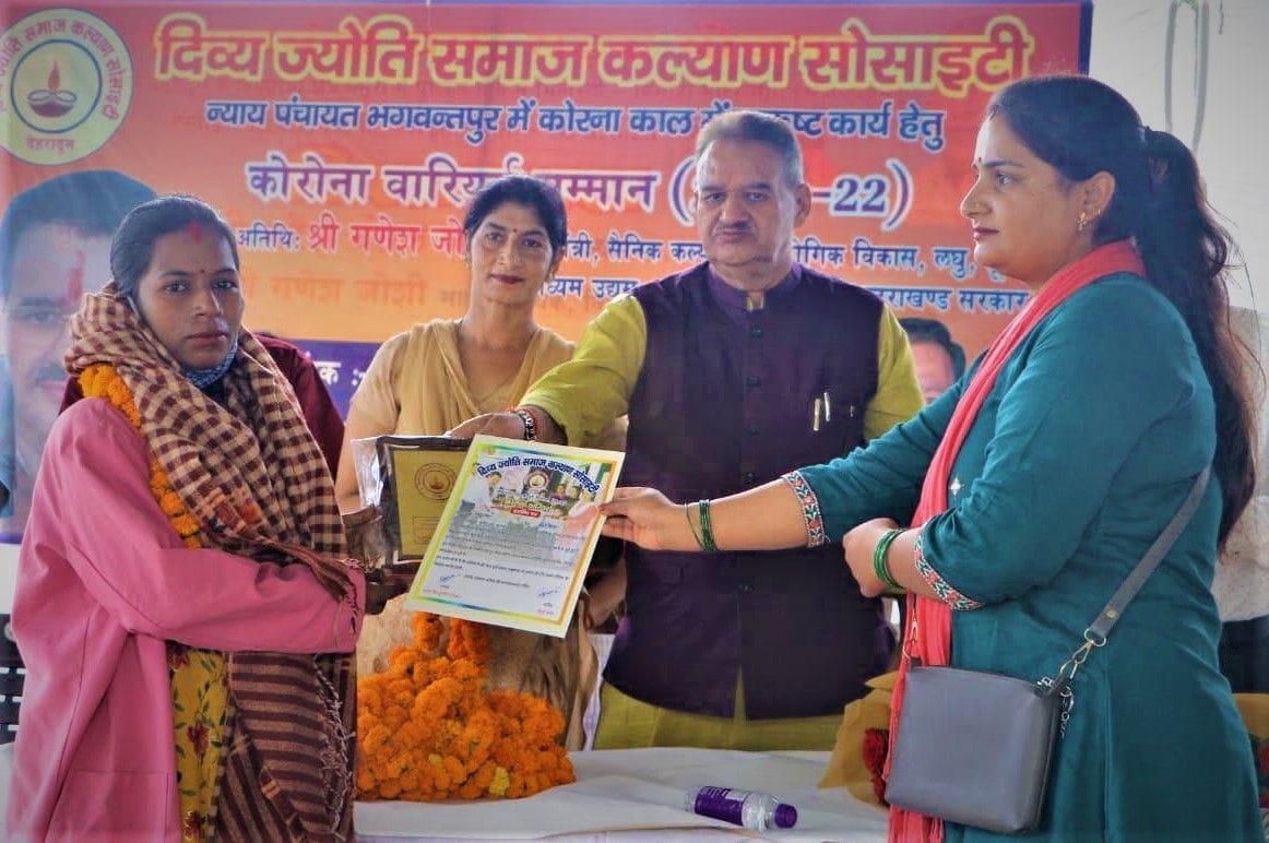 Asha, Anganwadi workers honored