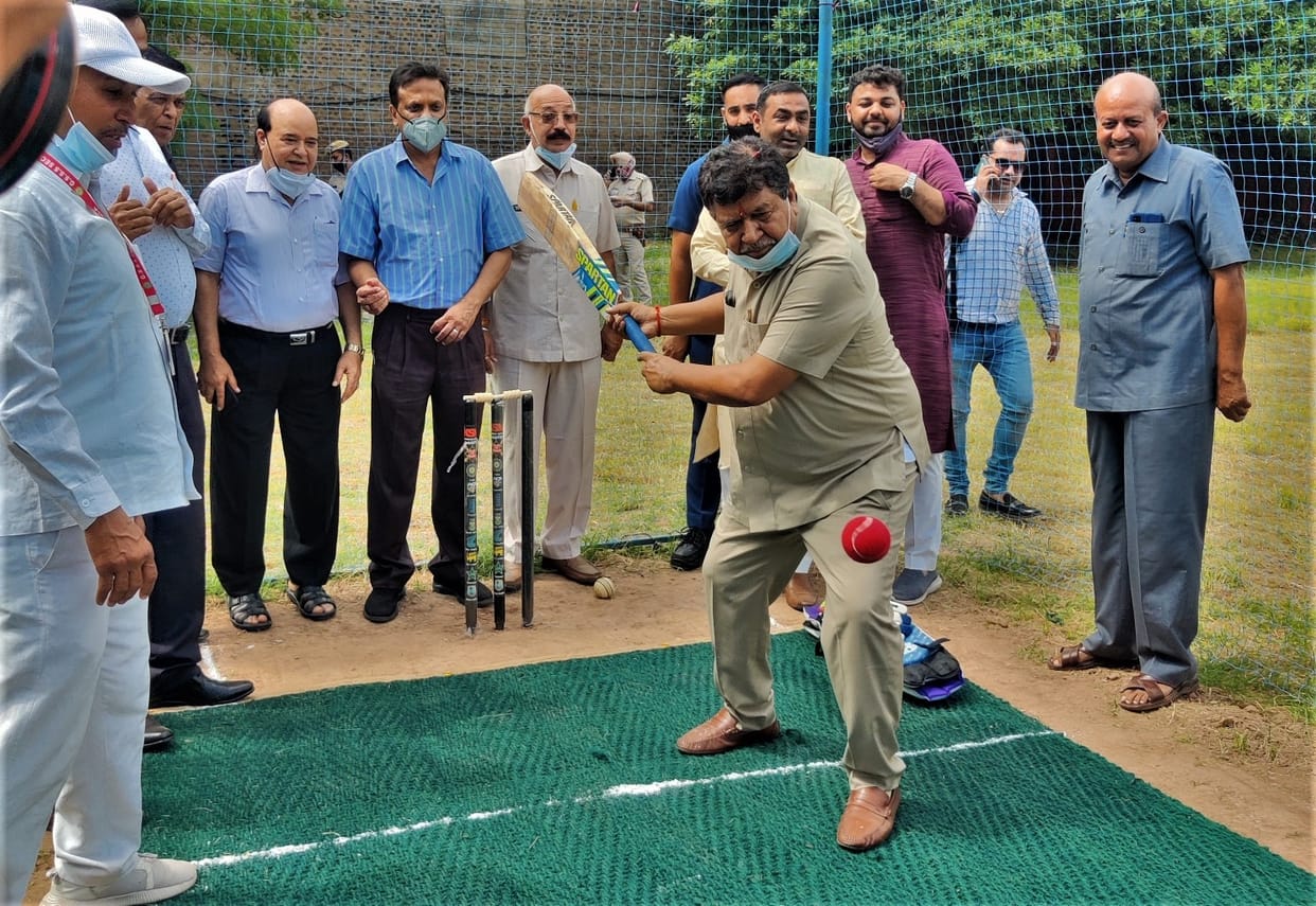 Net installed for cricket practice, assembly speaker played match