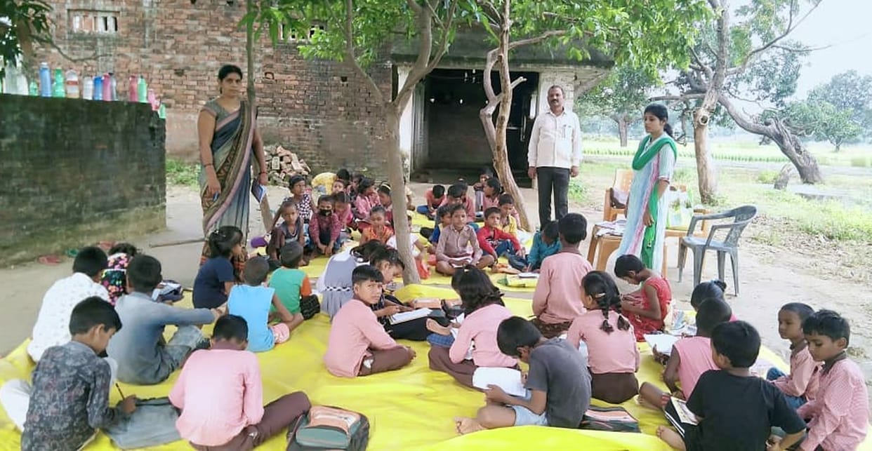 Water filled in school, classes running in the open