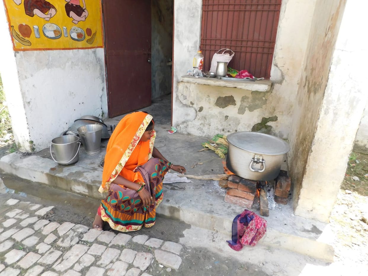 Kitchen is in bad shape, food is prepared on earthen stove