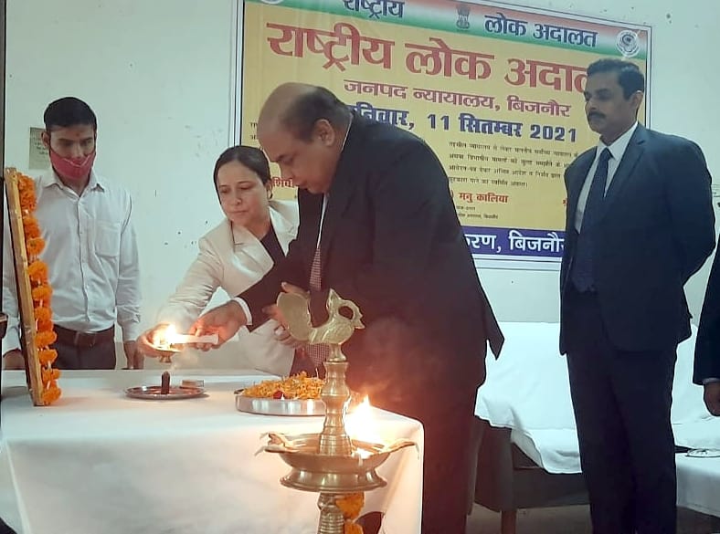 Disposal of 12989 cases in National Lok Adalat
