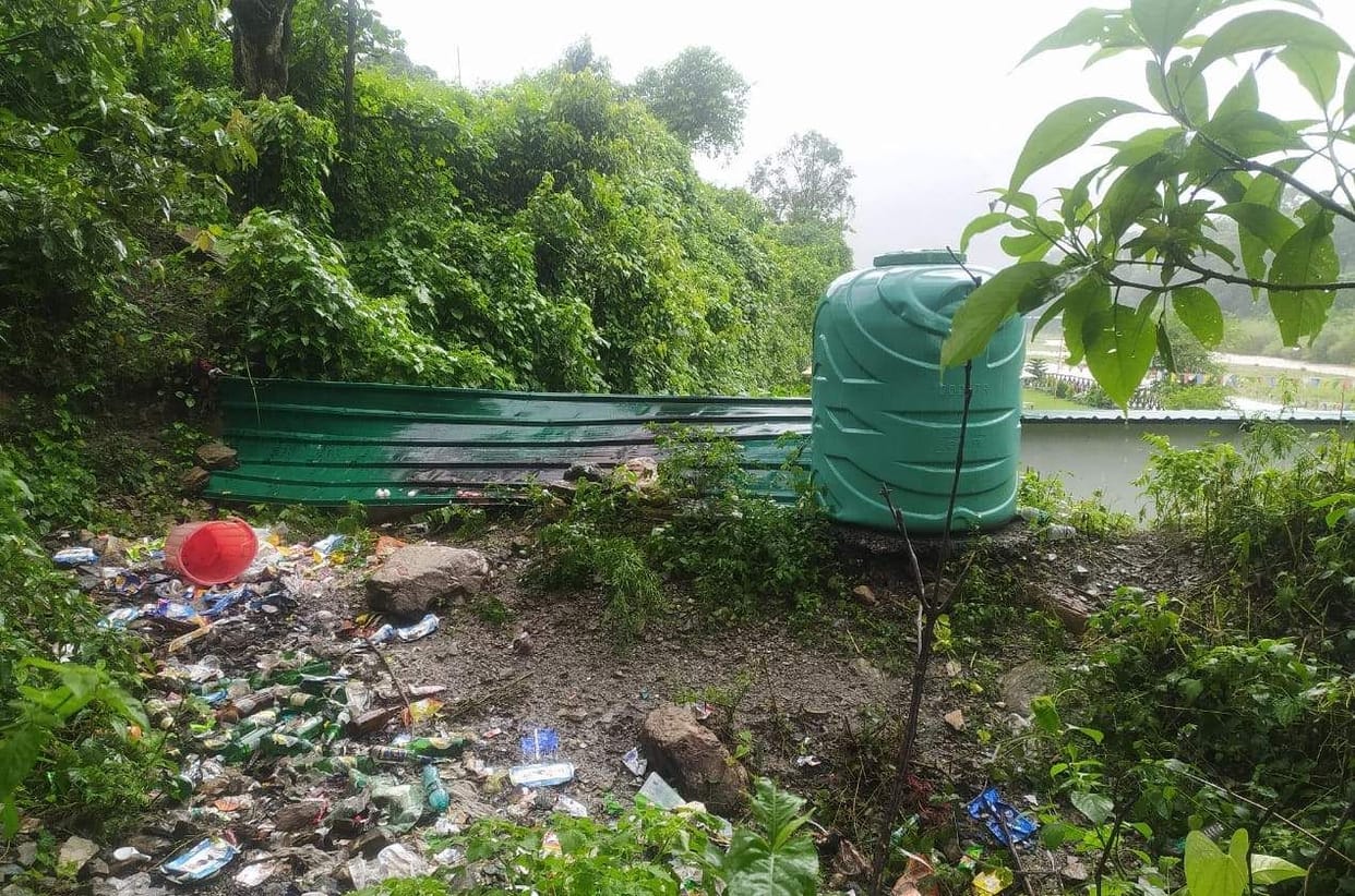 Camp operators throwing garbage in the open