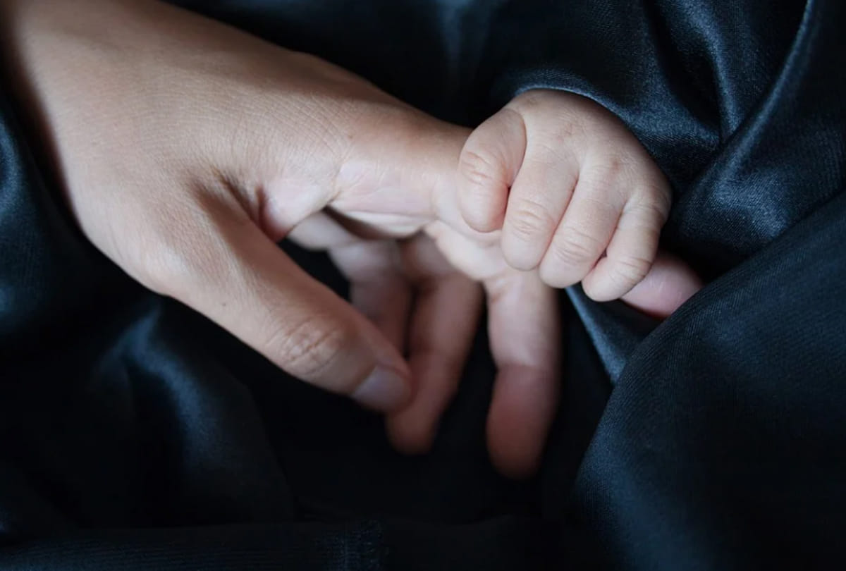 baby born with four hands four legs one head in katihar bihar news goes viral on social media