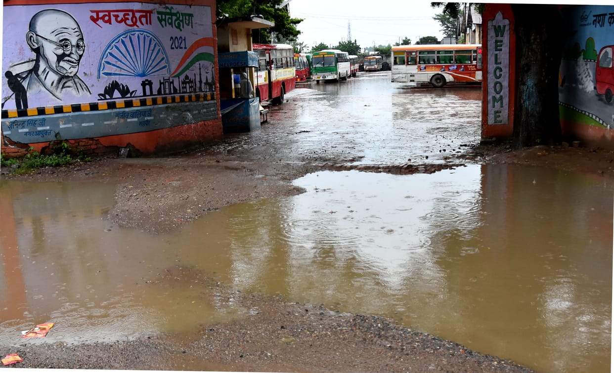 Mud spread due to rain, overturned vehicles